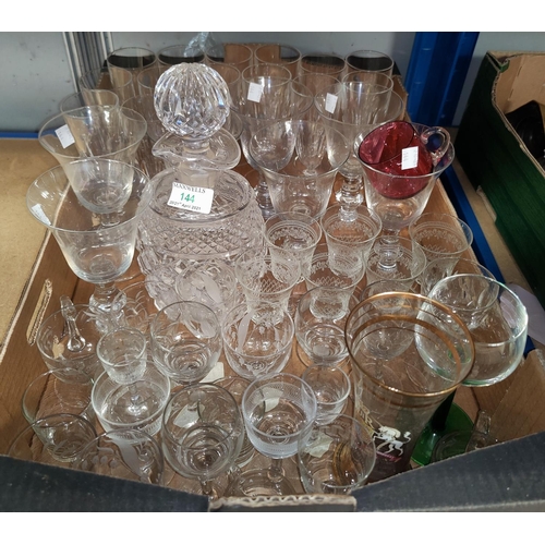 144 - A Waterford style cut glass decanter; 15 Champagne flutes and other drinking glasses.