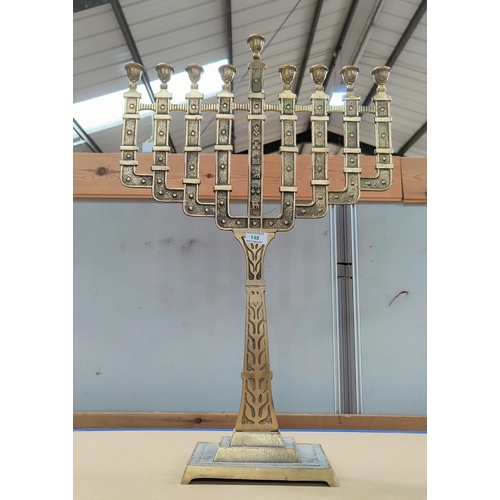 148 - A large brass 9 branch menorah/hanukkah.