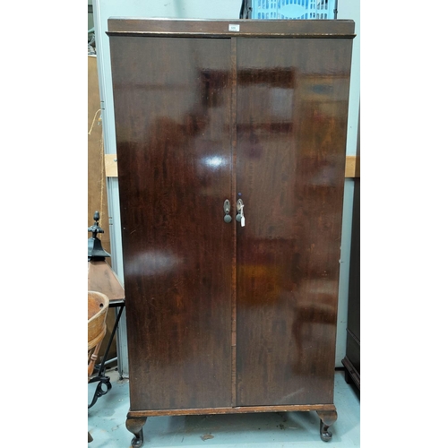 529 - A 1930's mahogany gent's 'Compactum' part fitted 2 door wardrobe