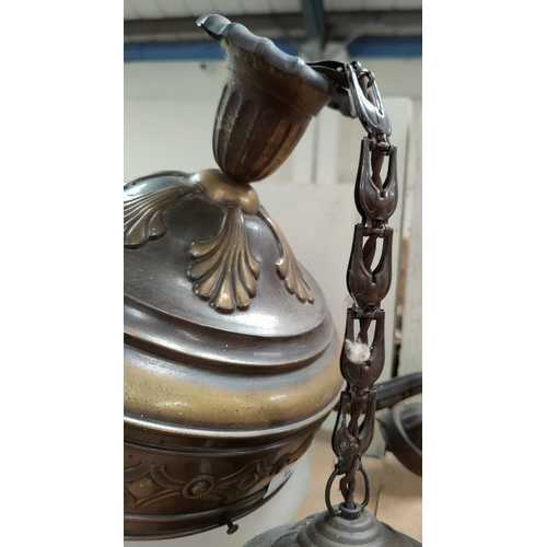 206 - An early 20th century 3 branch light fitting with glass shades