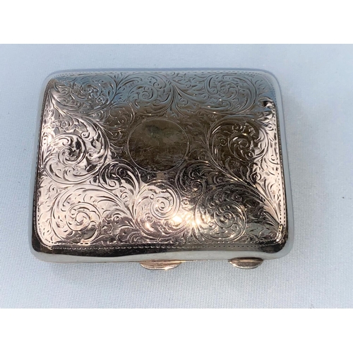 499 - A Hallmarked silver cigarette case with engraved floral decoration Chester 1911 2.9oz