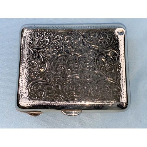 499 - A Hallmarked silver cigarette case with engraved floral decoration Chester 1911 2.9oz