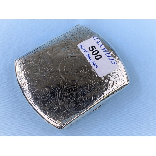 500 - A hallmarked silver cigarette case with engraved decoration, monogram and internal dedication Birmin... 