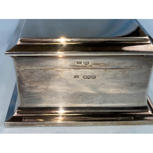 503 - A hallmarked silver box with wooden interior, polished ebonized base Sheffield 1952 by Walker and Ha... 