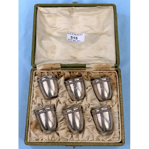 515 - A cased set  of 6 French white metal tot cups with tongue and dart borders, 1.7oz.