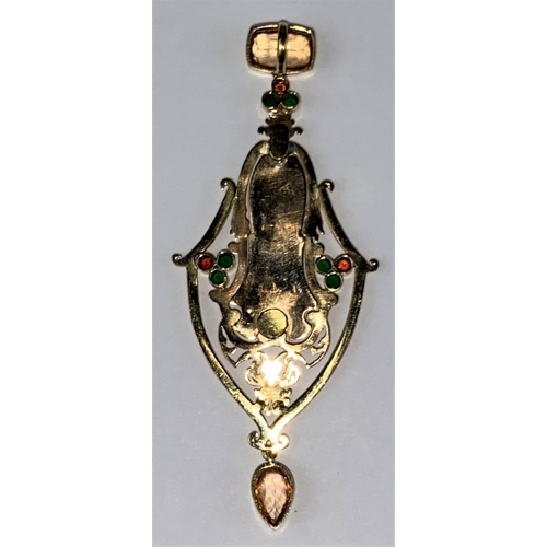 443 - A vintage yellow metal pendant, probably Spanish with coloured enamel birds and flowers on a black e... 