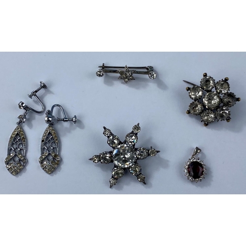 472 - A Victorian hallmarked silver and foiled paste set star brooch Birmingham 1899, a later similar gilt... 