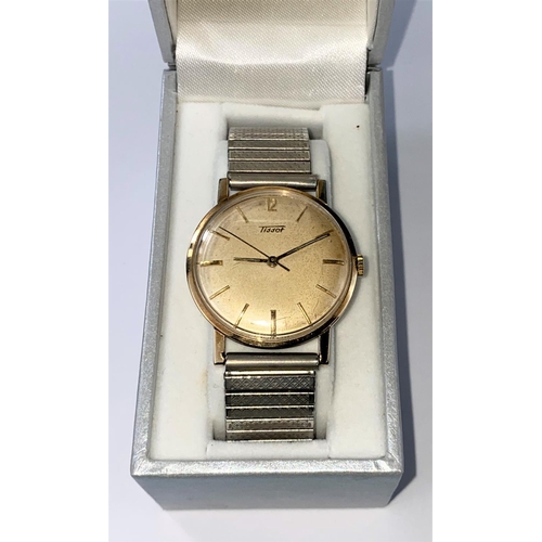 476 - A 1960's Tissot gent's mechanical wind dress wristwatch with 9ct gold case, later expanding wrist st... 