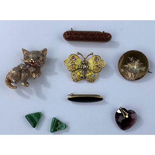 478 - A Panette gilt cat brooch, a similar butterfly brooch, a copper coloured glittering bar brooch, a gi... 