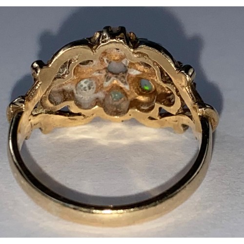 419 - A 9 carat hallmarked gold dress ring set 9 opal coloured stones, 3 gm, size K (1 stone slight chip)