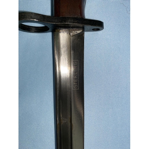 179 - A BRITISH no5 Mk1 pattern Jungle carbine bayonet and scabbard, the blade etched STERLING but otherwi... 