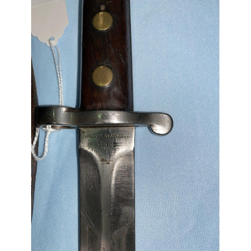 180 - A British Wilkinson 1888 Pattern Lee Metford bayonet and scabbard, the blade stamped double R, W.D. ... 