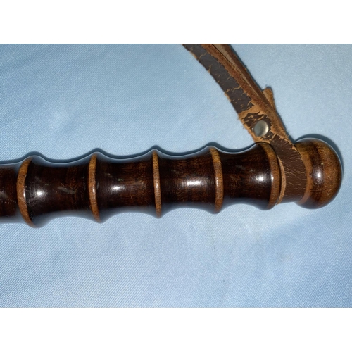 228 - A British Transport Police helmet, a hardwood truncheon