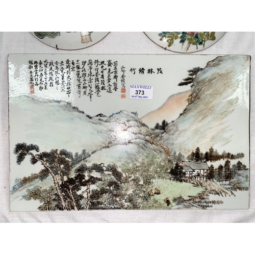 373 - A Chinese rectangular ceramic plaque decorated with mountain scene with Chinese text to right hand s... 