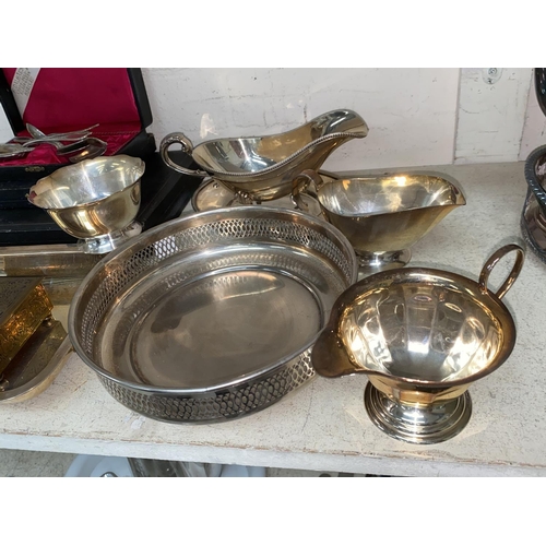 496 - An ornate silver plated tray and other silver plate and cutlery