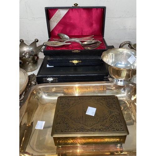 496 - An ornate silver plated tray and other silver plate and cutlery