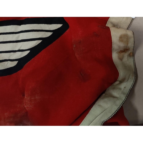 154 - A German WWII era flag, with perhaps contemporary damage.  Size: 182cm x 104cm