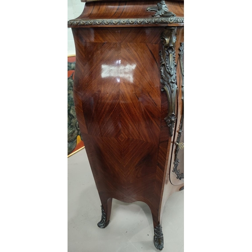 553 - A large 19th Century Louis XV style quarter veneered Kingswood Bombay commode cabinet with variegate... 