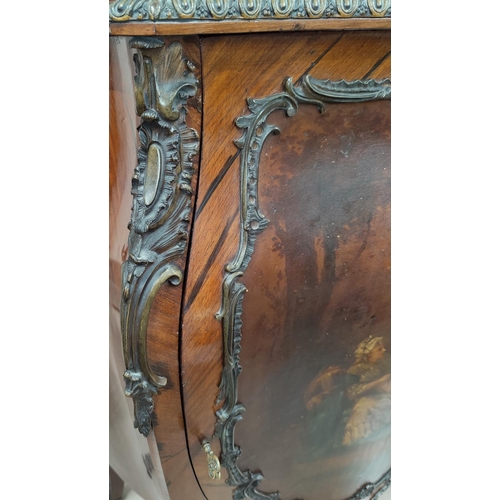 553 - A large 19th Century Louis XV style quarter veneered Kingswood Bombay commode cabinet with variegate... 