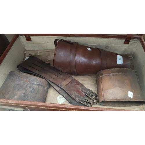 56 - A pair of leather spats and a belt; 2 leather suitcases