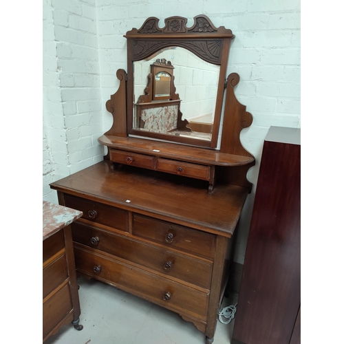 570 - An Edwardian stained walnut 2 piece bedroom suite comprising dressing table and marble top washstand