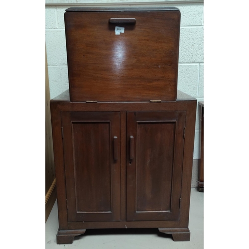 575 - A 1930's drinks cabinet with fall front upper section over double cupboard