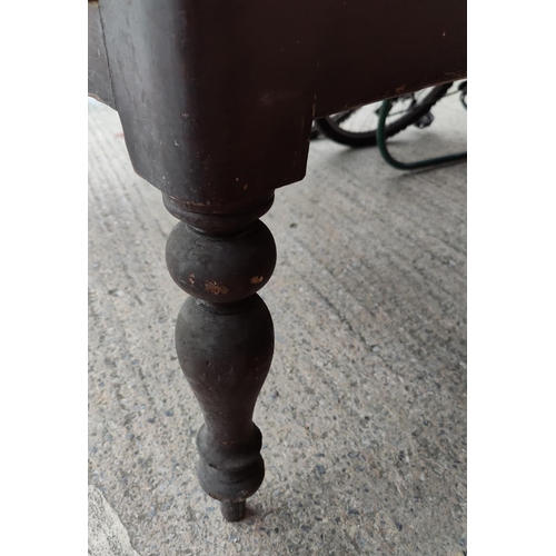 581 - A 19th century farmhouse side/kitchen table in stained pine, length 153 cm