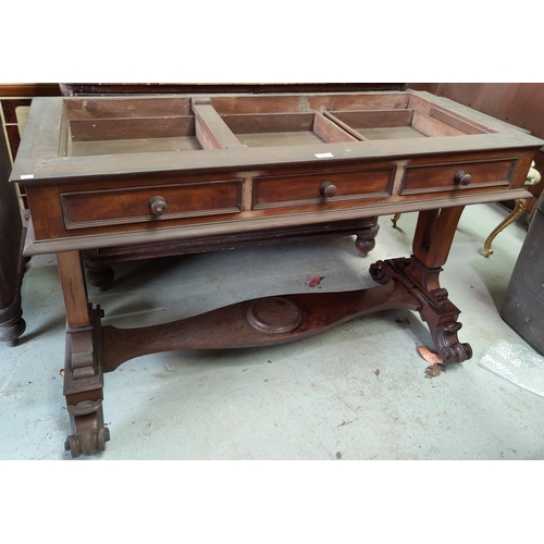 591 - A Victorian mahogany side table/washstand with 3 frieze drawers, pierced end supports, on scroll fee... 