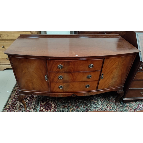 597 - A 1930's mahogany dining suite in the Queen Anne style comprising extending table with rectangular t... 