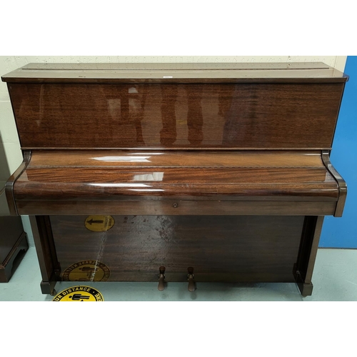 600 - A modern small piano in mahogany case, iron framed and overstrung, by John Broadwood & Sons, with bo... 