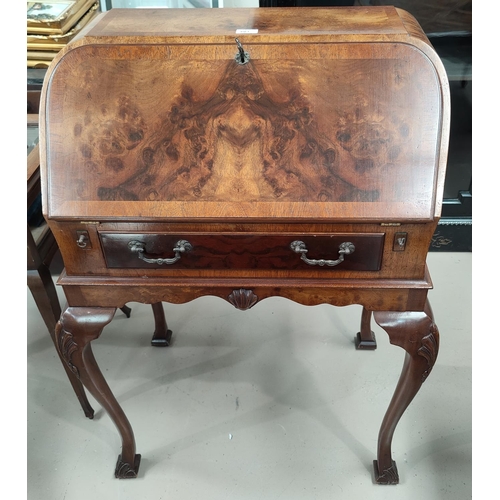 603 - A period style burr walnut 'bureau de dame' with frieze drawer, on cabriole legs, 69 x 48 x 102cm hi... 