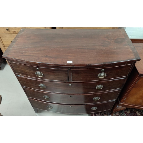 620 - An early 19th century mahogany bow front chest of 3 long and 2 short drawers with brass drop handles... 