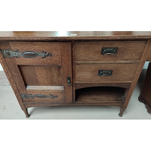 627 - An Edwardian inlaid oak sideboard in the Arts & Crafts style with mirror back, side cupboard  on str... 