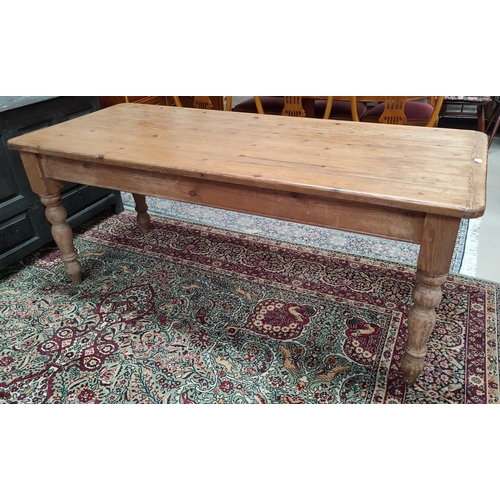 630 - A Victorian style pine dining table with rectangular top, length 190 cm