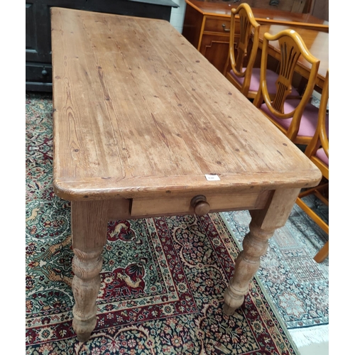 630 - A Victorian style pine dining table with rectangular top, length 190 cm