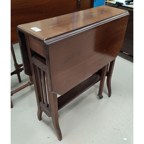 633 - An Edwardian mahogany Sutherland table on square tapering legs; a white painted 3 height bookcase