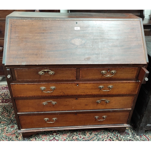 639 - An Edwardian bureau in Sheraton style inlaid mahogany with fall front over 3 long and 2 short drawer... 