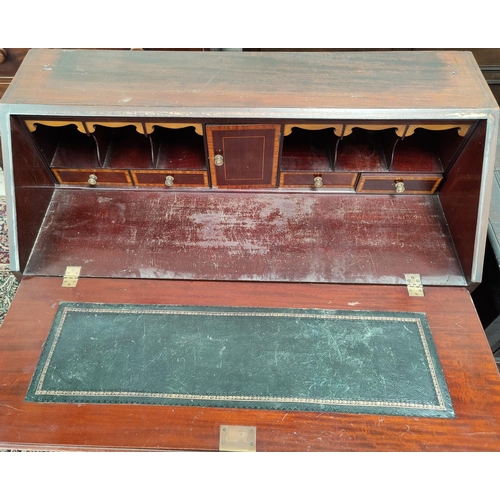 639 - An Edwardian bureau in Sheraton style inlaid mahogany with fall front over 3 long and 2 short drawer... 