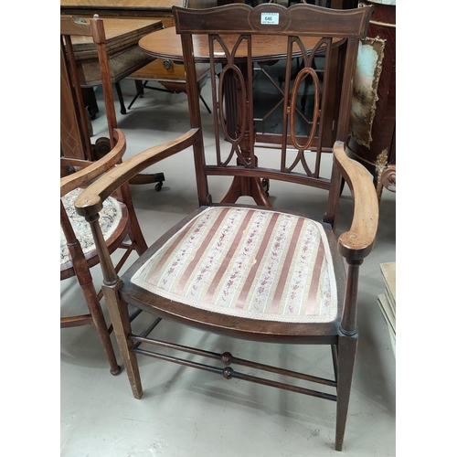 646 - An Edwardian Sheraton style inlaid mahogany armchair with pink stripe seat