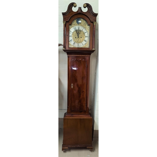 656 - An 18th century inlaid mahogany long case clock with brass mounted swan neck pedestal and turned col... 