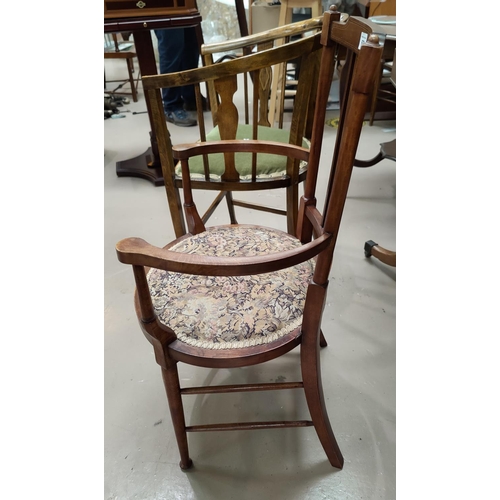 670 - An Edwardian inlaid mahogany small armchair