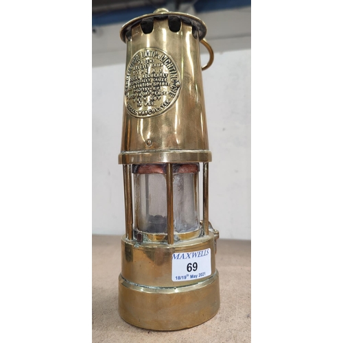 69 - A brass cased' Protector Lamp and Lighting' miners lamp