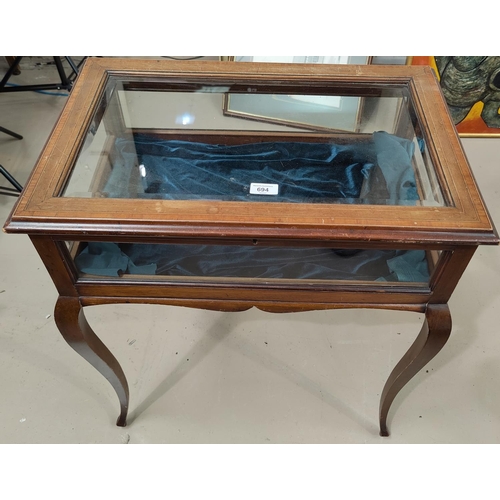 694 - A late 19th Century/early 20th Century inlaid mahogany bijouterie table with bevelled glass display ... 