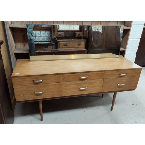 714 - A mid 20th century lightwood dressing table with 6 drawers, single long mirror, on tapering legs wit... 