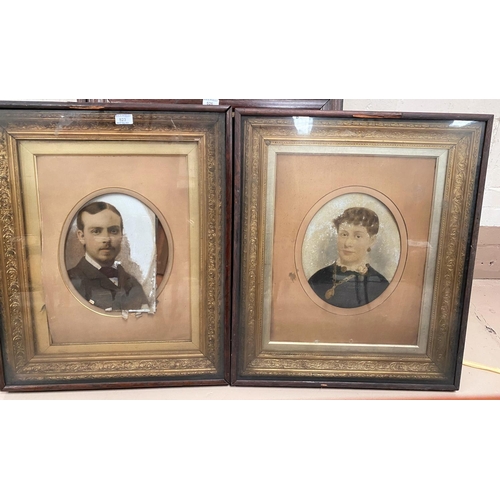 523 - A Victorian pair of cabinet frames containing photo portraits of a man and woman, 70 x 59 cm overall