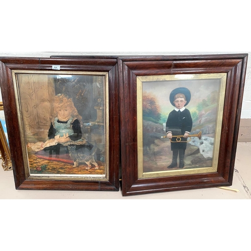 526 - A Victorian rosewood veneered cushion frame containing an overpainted portrait of a boy with a bugle... 