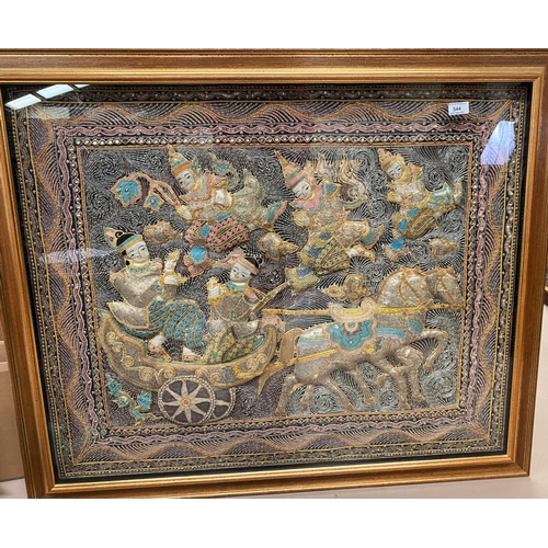 544 - A large 20th century eastern embroidered relief panel (Burmese) with gilt thread, sequins etc, 96 x ... 