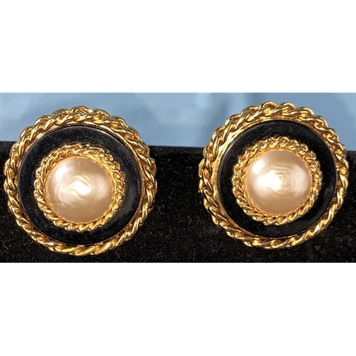458 - A pair of Chanel earrings with central domed pearl effect with gilt surround clip-on earrings (minor...