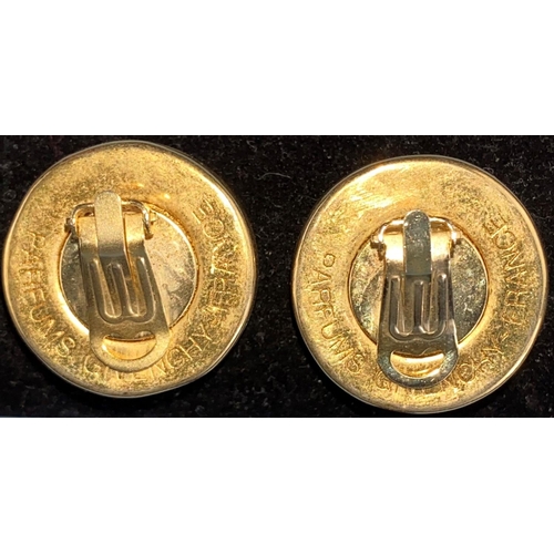 464 - A pair of Givenchy gilt circular earrings with stylized Givenchy symbol to centre