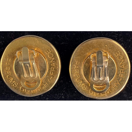 464 - A pair of Givenchy gilt circular earrings with stylized Givenchy symbol to centre